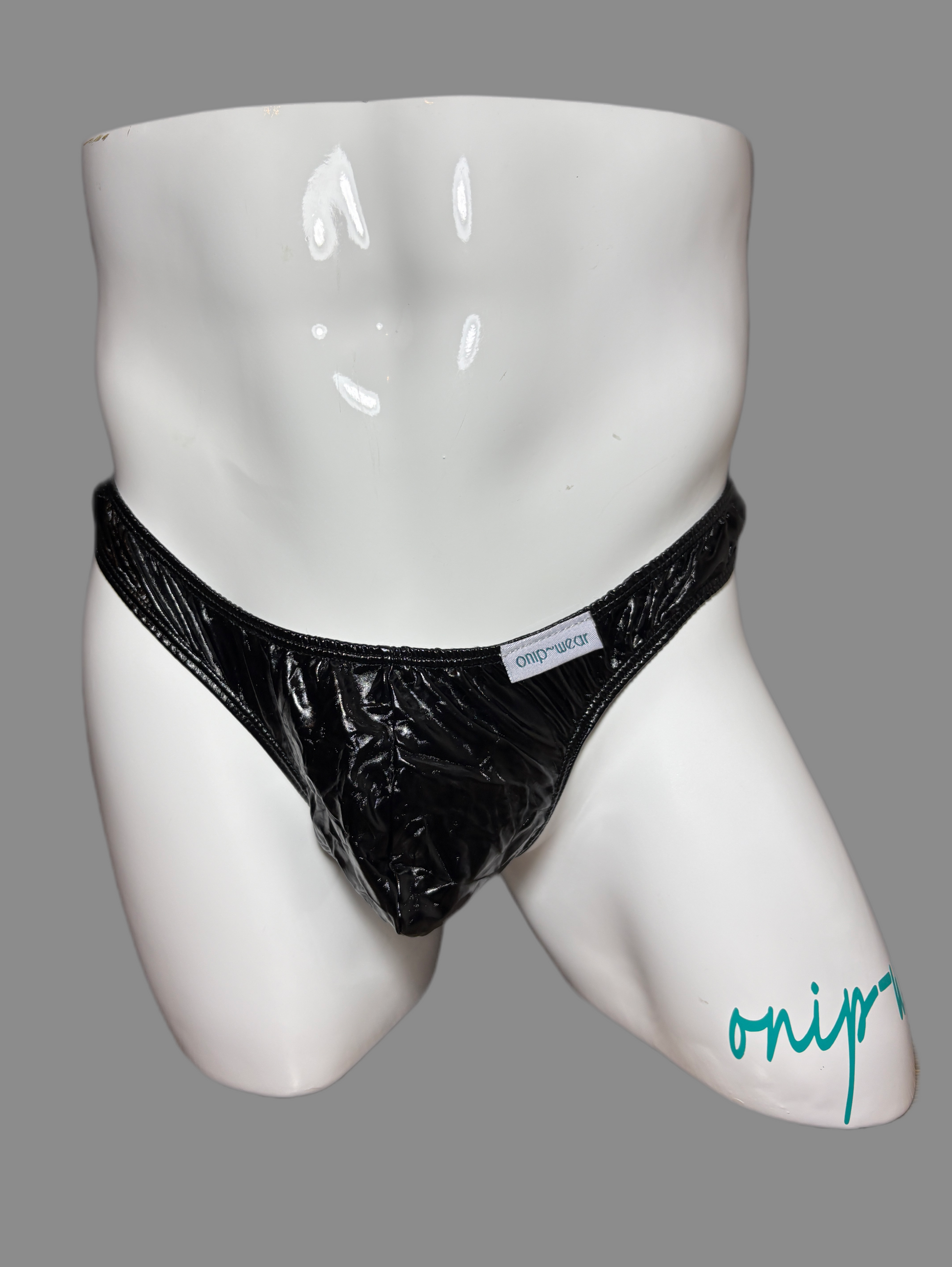 Black men's underwear on a white mannequin thong vinyl